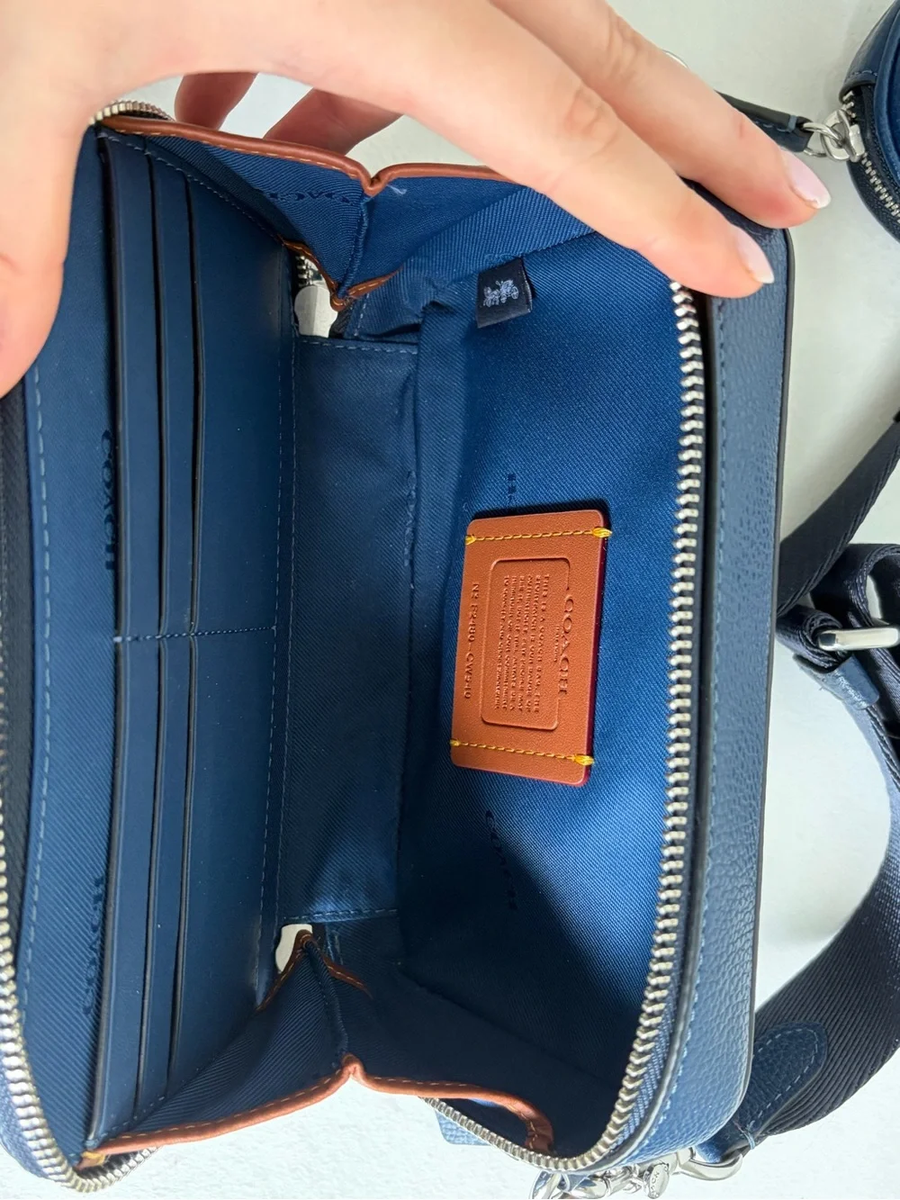 Coach Navy Fabric Interior with Tan Leather Creed Patch